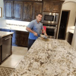 A granite kitchen counter top being polished in McKinney Texas