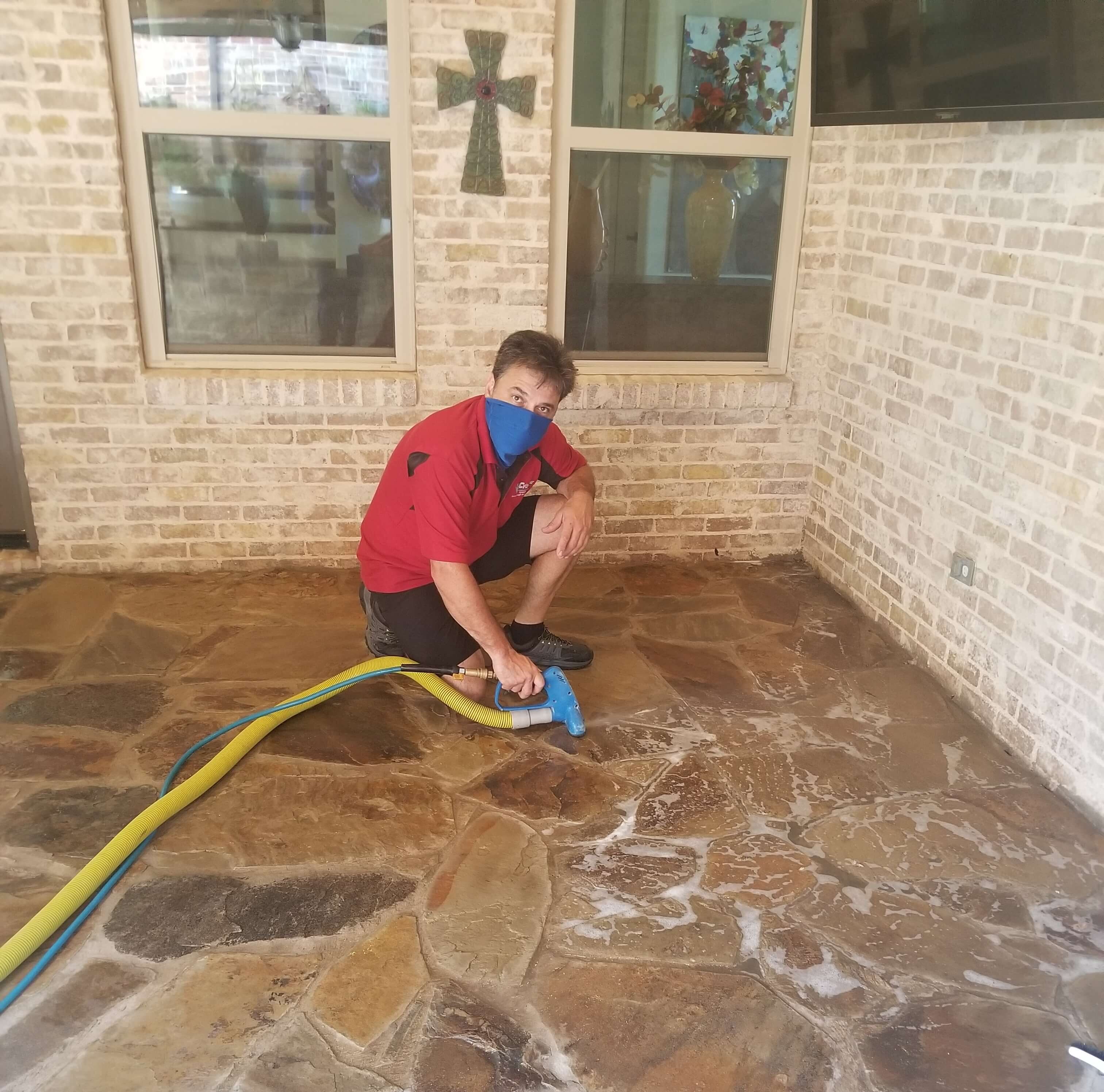 Stone patio cleaning and sealing in Carrollton, Texas.