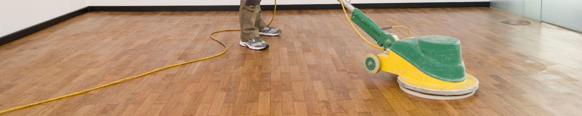 wood floor being professionally cleaned
